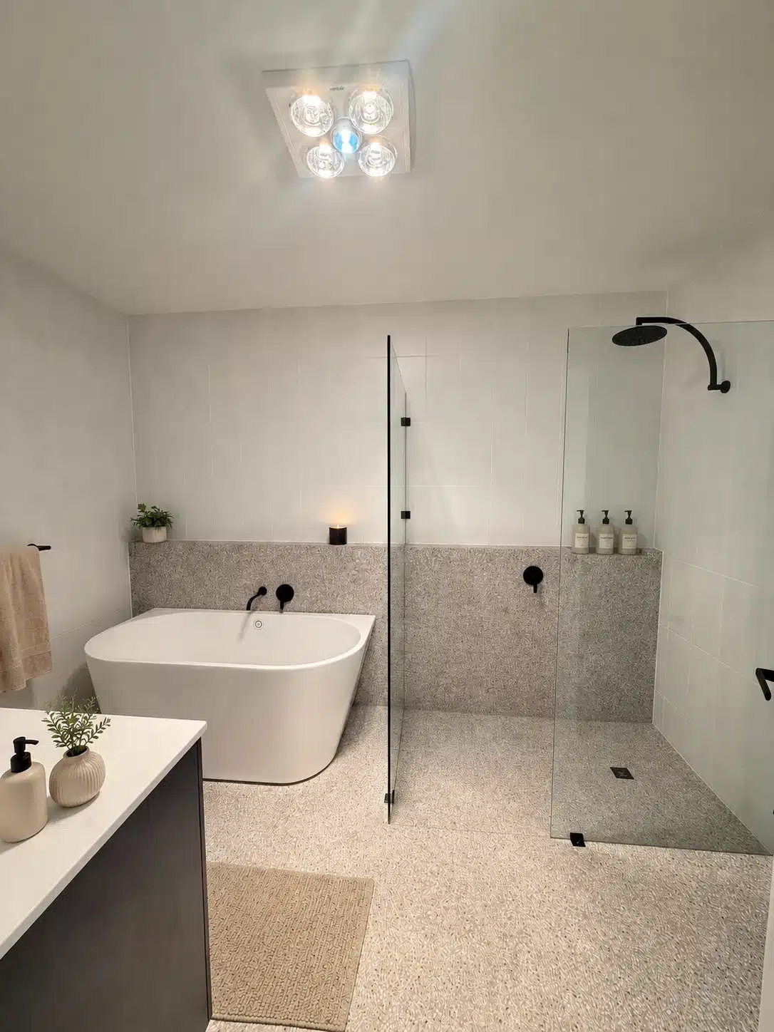 Main Bathroom upstairs with bath, large shower and double sink.